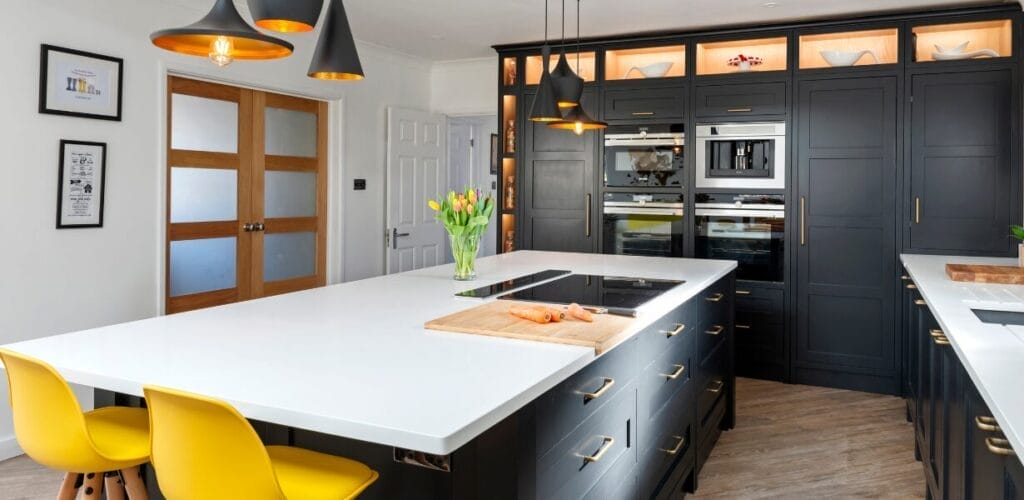 White Quartz Kitchen with Blue Cabinets