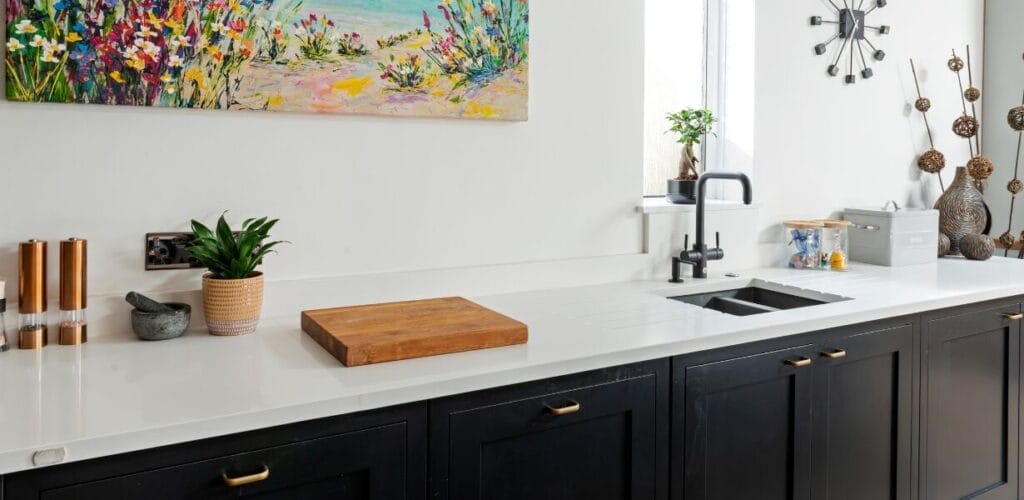 White Quartz Kitchen with Blue Cabinets 2