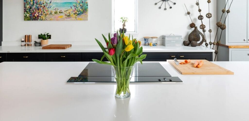 White Quartz Kitchen with Blue Cabinets 7